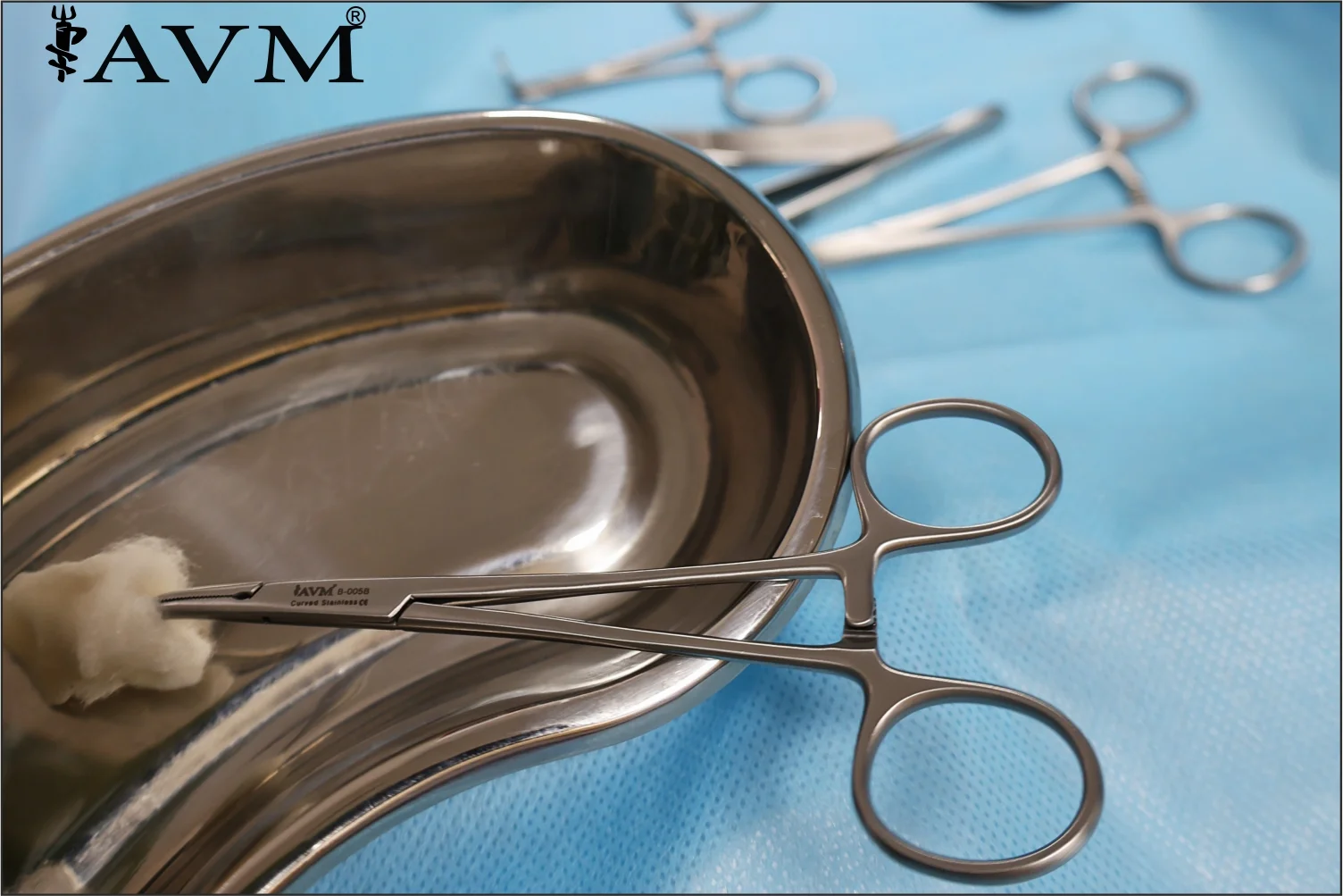 Close-up of AVM surgical instruments arranged on a sterile field